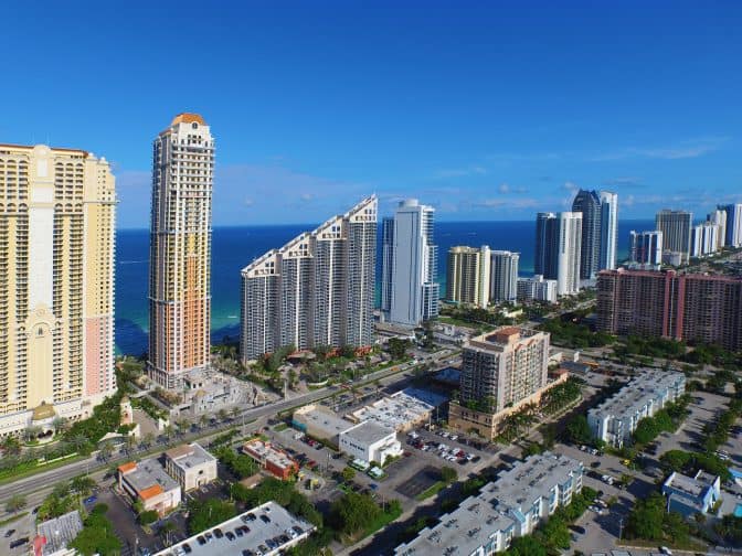 an aerial view of Sunny Isles beach high rises and the Acqualina resort, a top romantic getaway in Florida