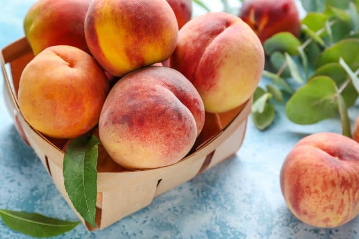 a box of ripe peaches to make peach cobbler